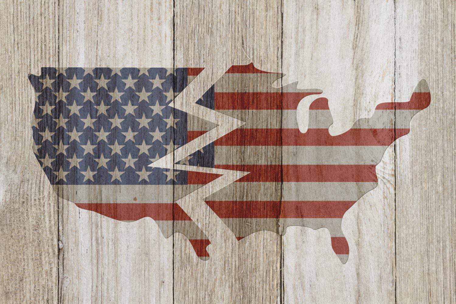 Divided USA patriotic old flag on a map with weathered wood background with copy space for your message