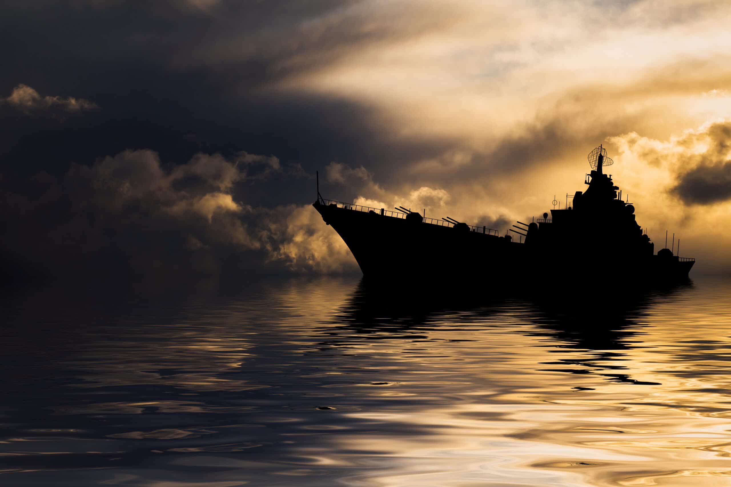 Warship at sunset in the sea. Fleet flagship