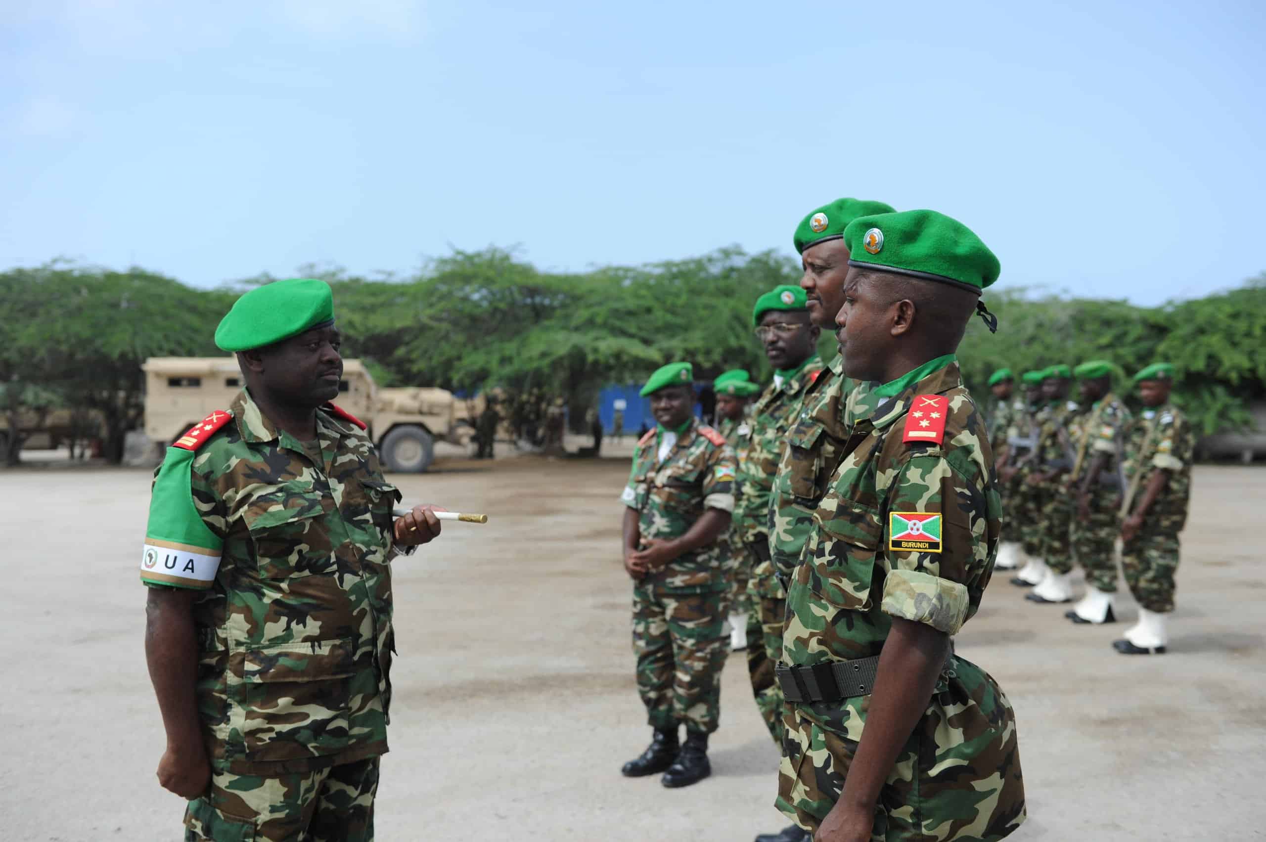 AMISOM&#039;s Force Commander, General Silas Ntigurirwa, greets officers during a ceremony to mark their rotation at Burundi&#039;s military base in Mogadishu, Somalia, on July 26. AMISOM Photo (14577825348) by AMISOM Public Information