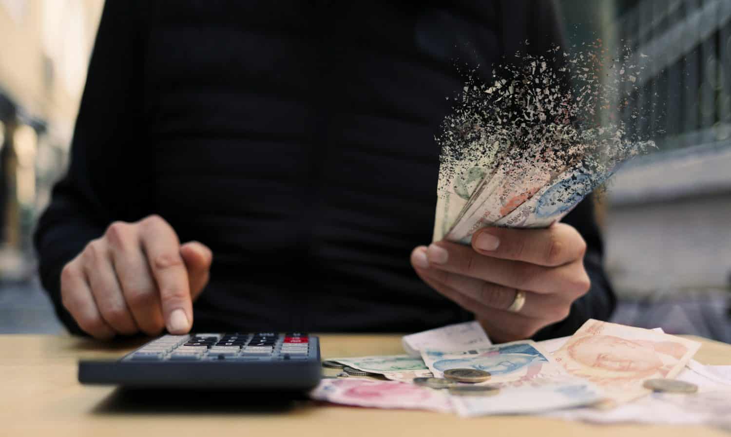 hand holding money. Financial crisis concept. suitable for money, economy, finance and bank themes.