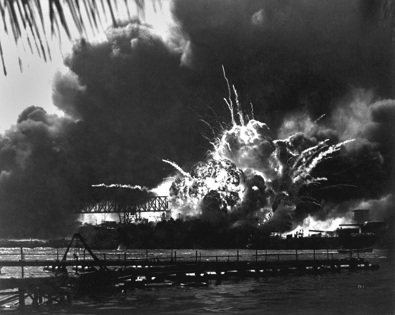 Explosion of the USS Shaw&#039;s forward magazine during the Japanese attack on Pearl Harbor, Dec. 7, 1941. The Shaw was repaired and served in the Pacific through World War 2.