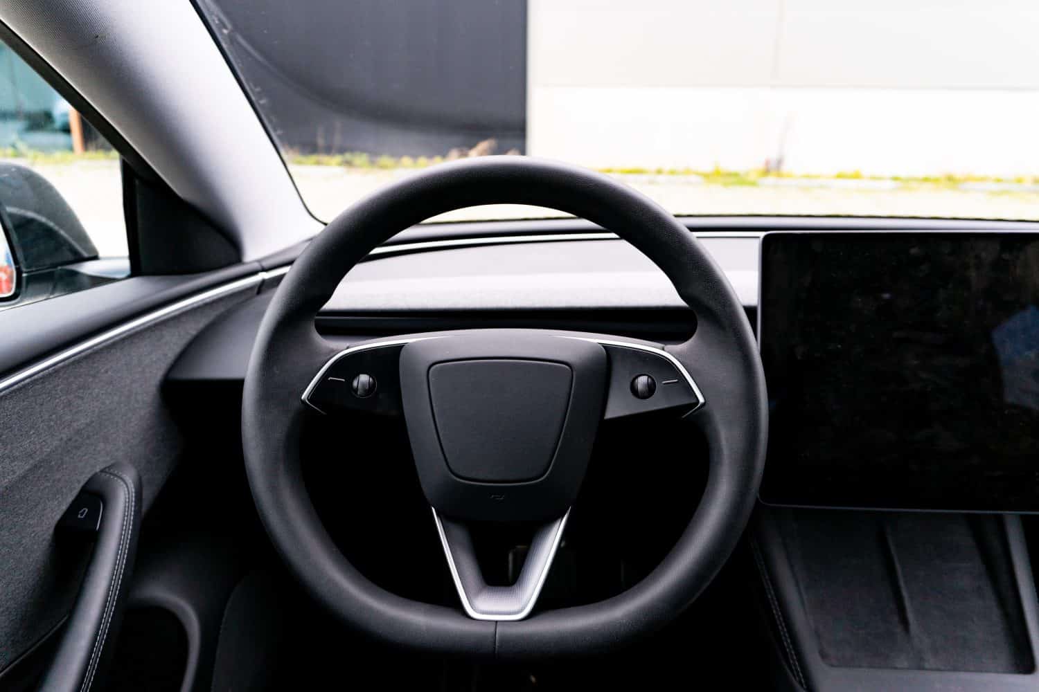 Stalkless Steeringwheel of Modern American Electric Car Sedan