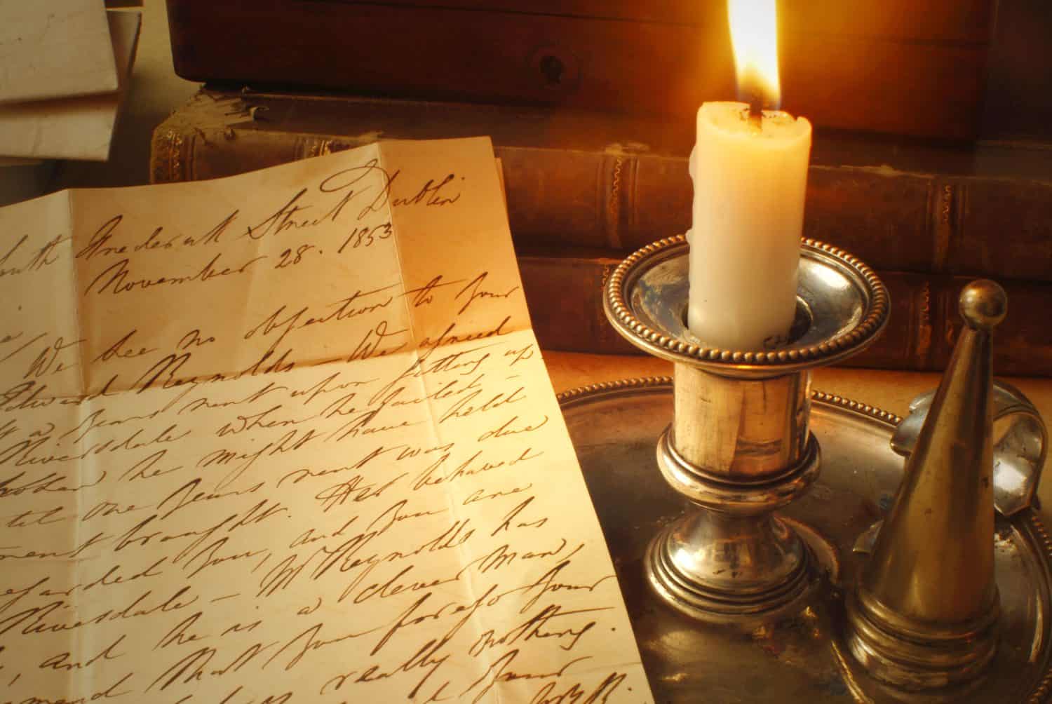 Reading a letter by candle light from 1800&#039;s