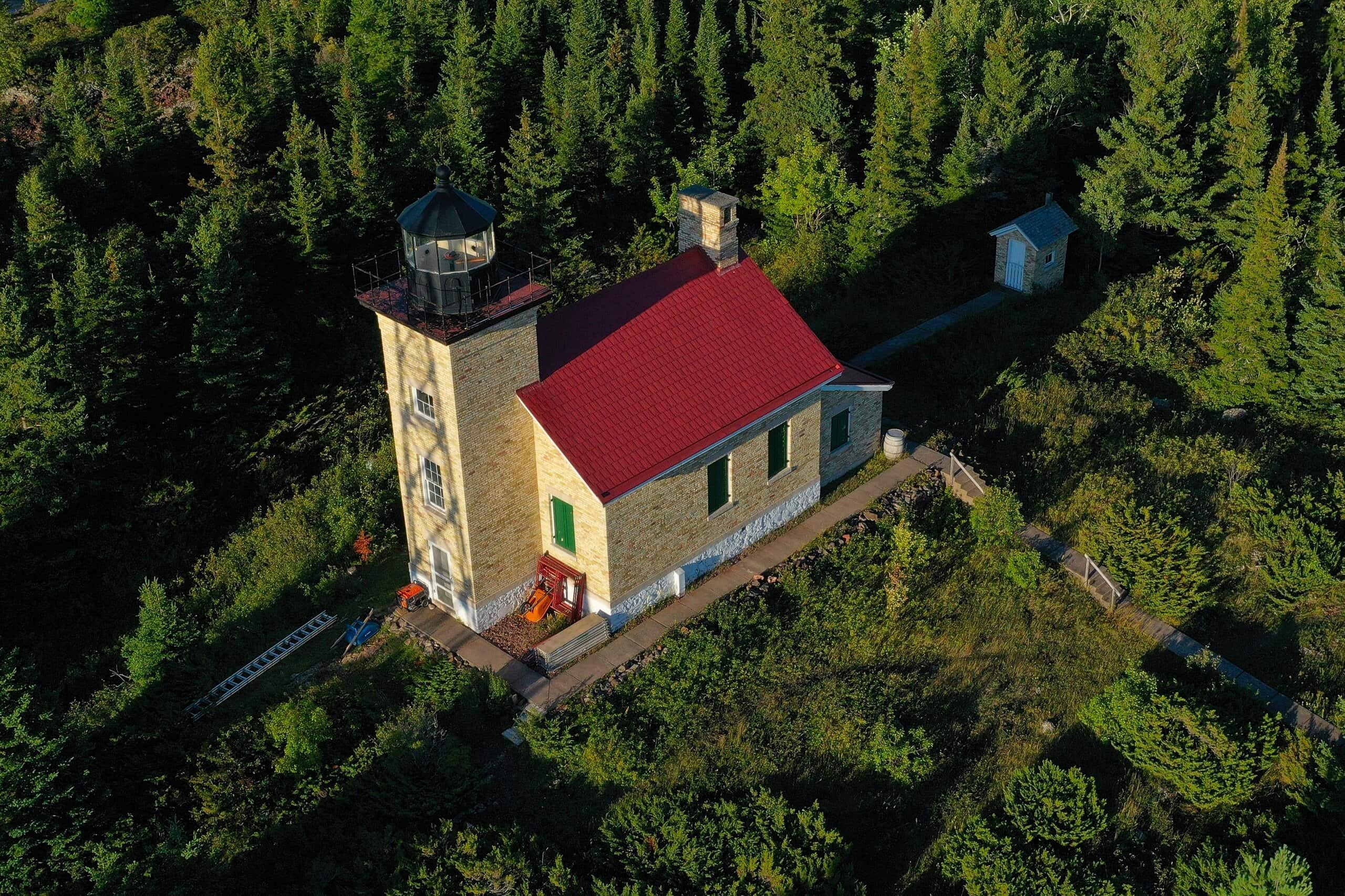 Copper Harbor Light from the a... by August Schwerdfeger