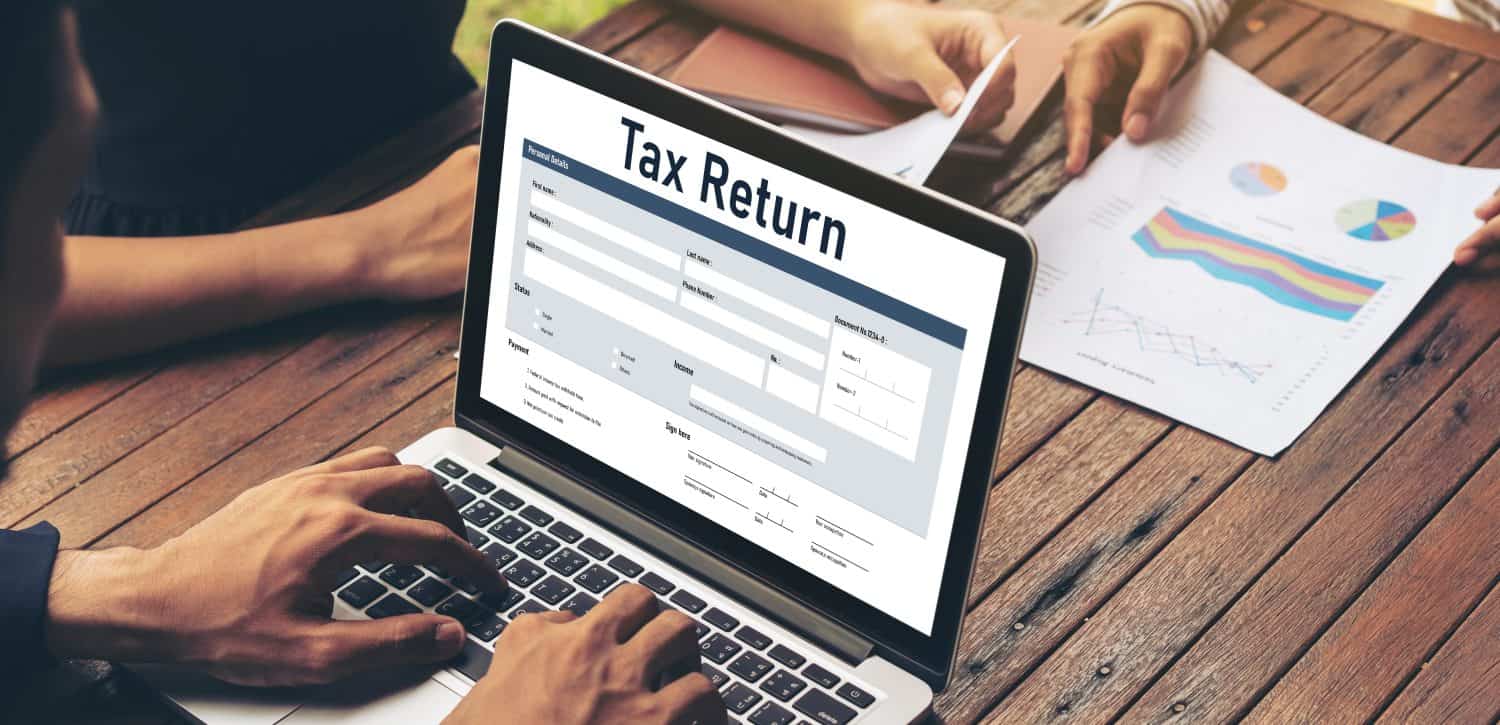 Online tax return form for submitting individual income tax return form snugly on the internet website. Government web for tax payment and return. Taxation technology concept.