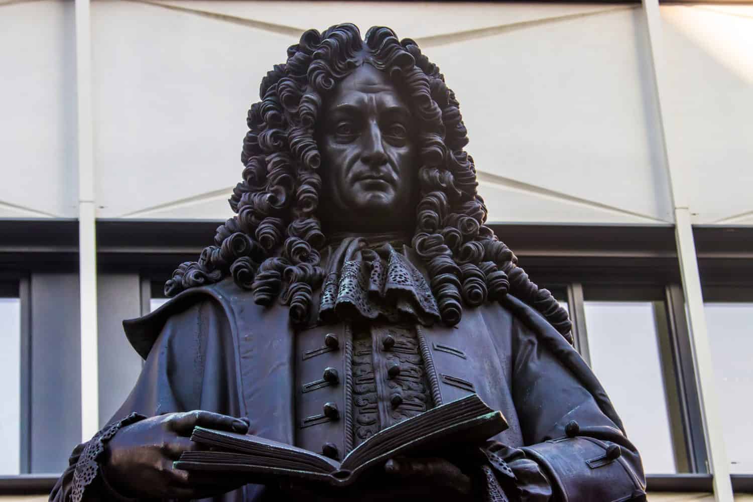 the statue of Gottfried Wilhelm Leibniz in Leipzig University. He was a prominent German polymath and one of the most important logicians, mathematicians and natural philosophers of the Enlightenment.