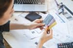 Credit Card Debt Hit $1.28 Trillion as Americans Save Less Despite Higher Incomes