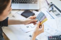 Credit Card Debt Hit $1.28 Trillion as Americans Save Less Despite Higher Incomes