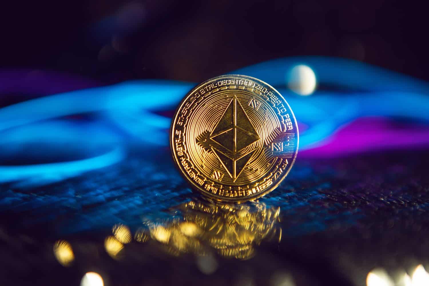 gold iron coin ethereum on a shiny silver background. blue and pink wire cyberpunk in future