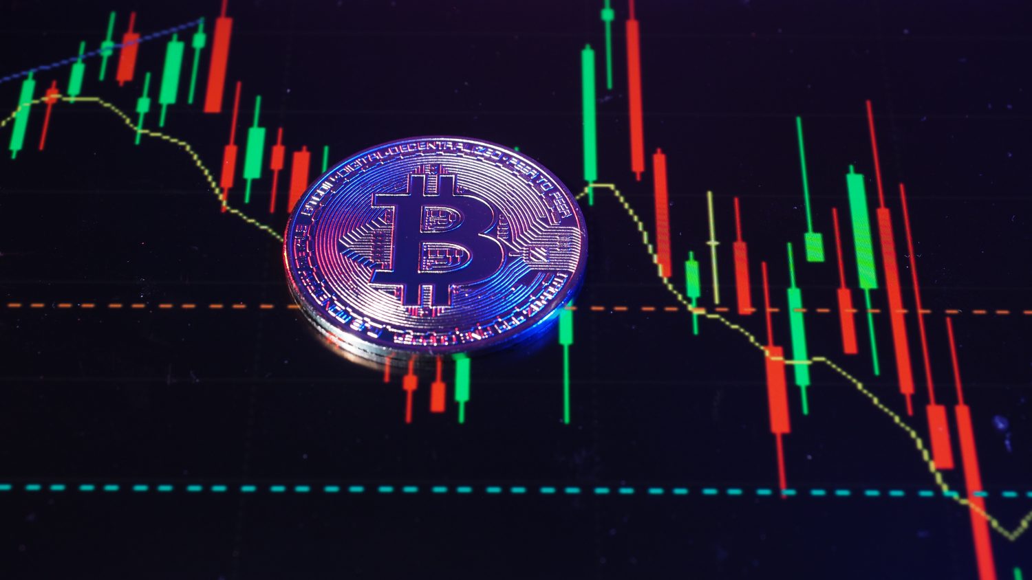 Close up bitcoin and digital stock market graph bar on black. Cryptocurrency. Bitcoin Stock Growth. Investing in virtual assets. Investment platform with charts and bitcoin coin. digital money.