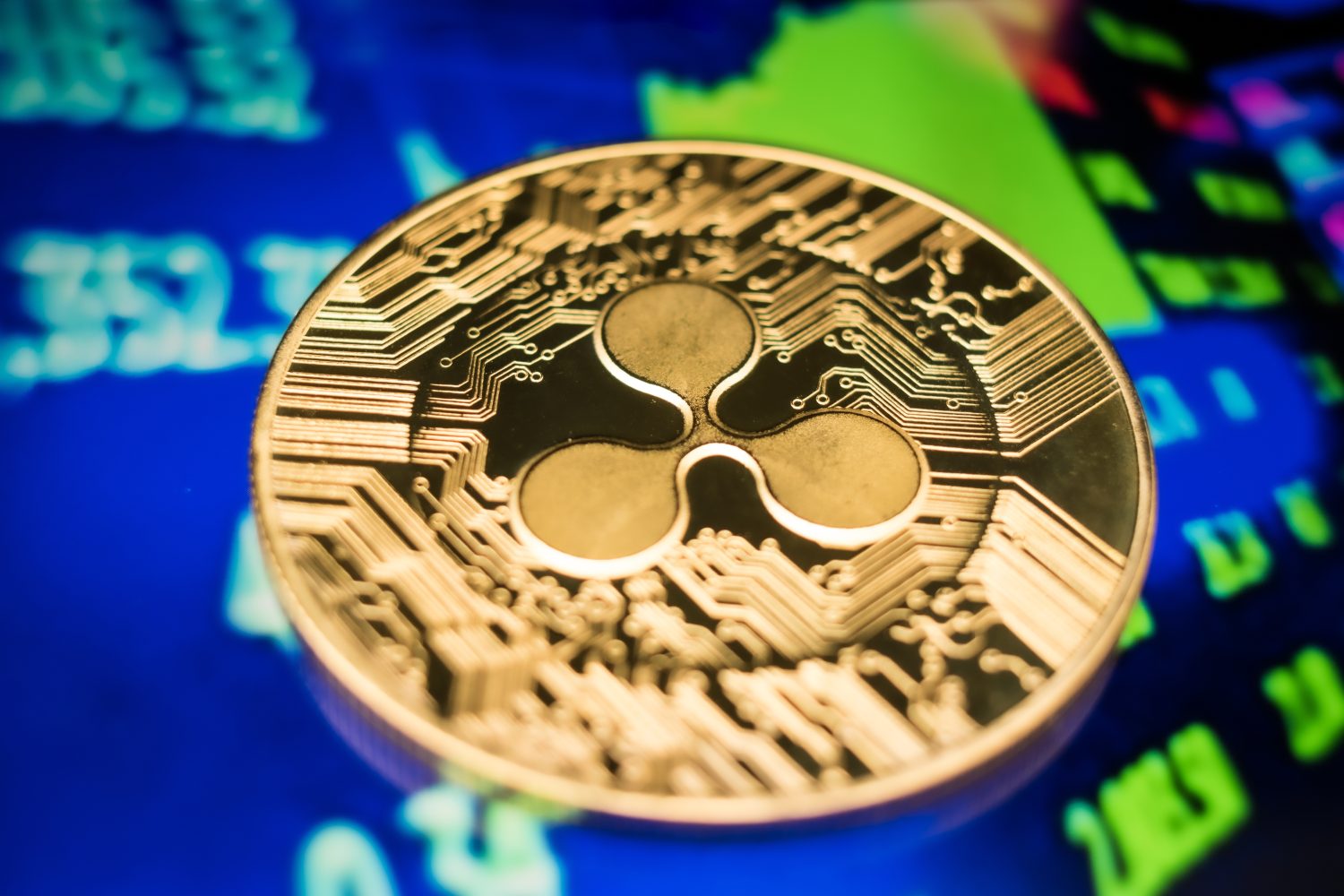 Golden Ripple XRP Coin on Futuristic Digital Technology Background
