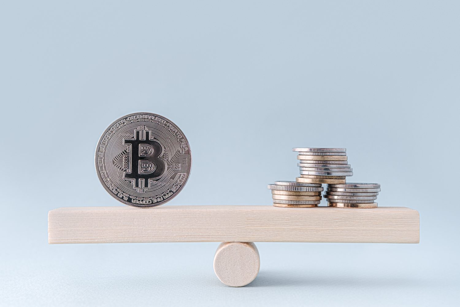 Symbol of scales. Bitcoin BTC Cryptocurrency Coins. Stock Market Concept. Exchange bitcoin cash for a money. Digital modern method of payment. Savings, investments concept. Silver bitcoin close up