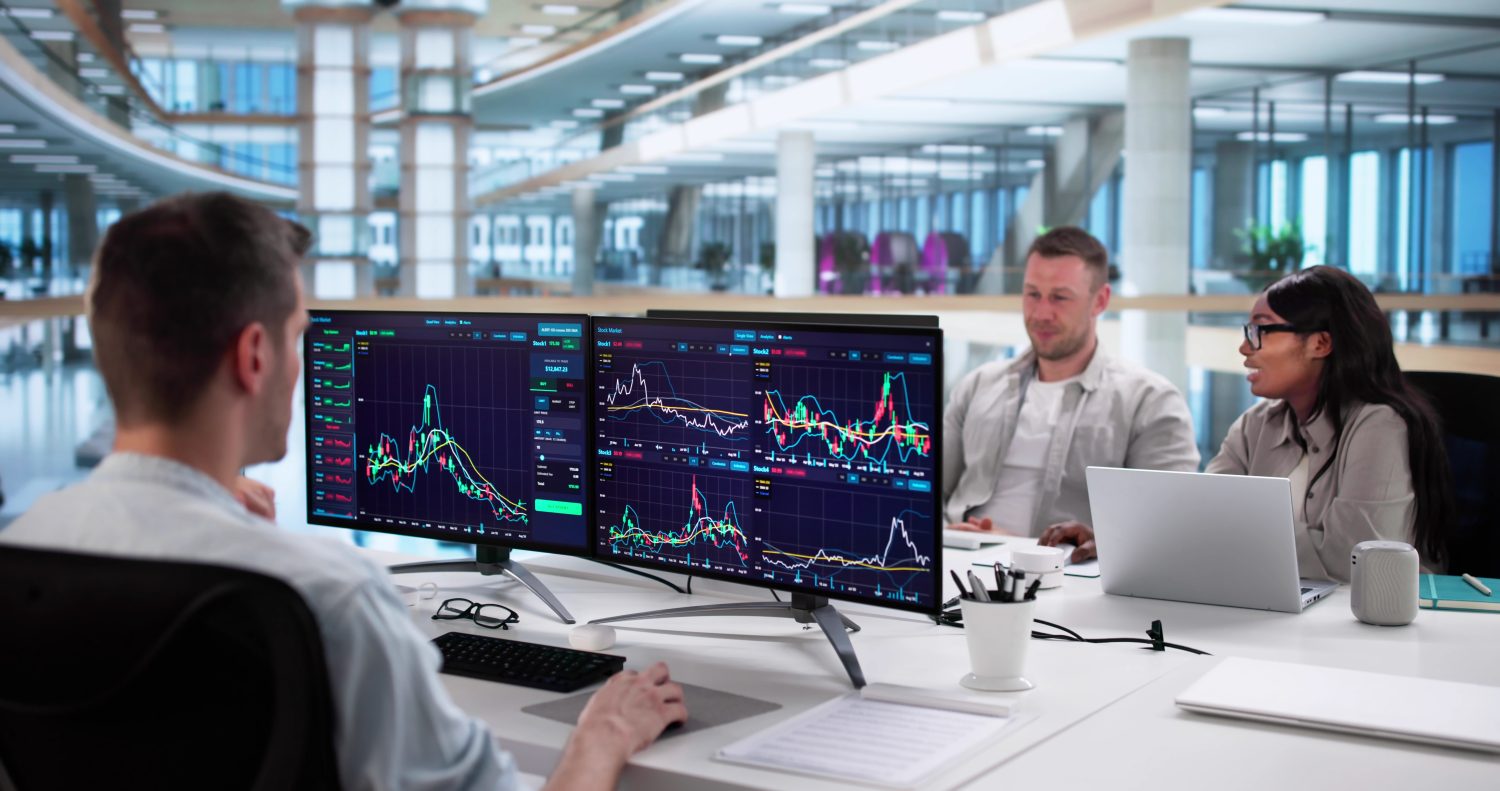 Multiracial Team Of Data Analysts Predicting Stock Market Trends Together