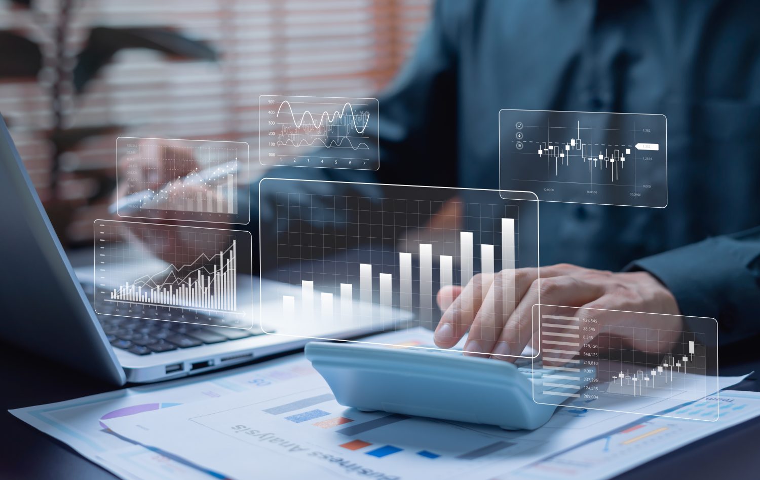 Businessman working on finance and accounting reports with calculator and growth chart, representing business financing, banking, investment, and financial management strategy